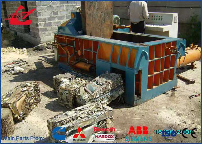 1250KN Scrap Metal Baler Machine 1.5-2Tons/hour Production Rate With Automatic Operation Model